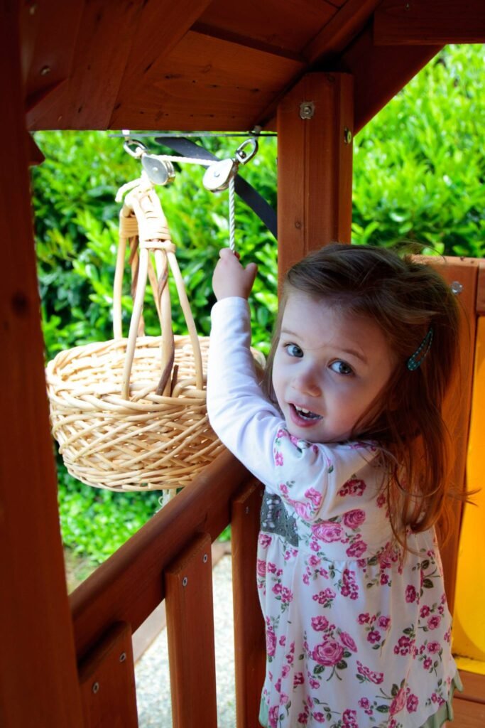 Child Reaching for a Wicker Basket