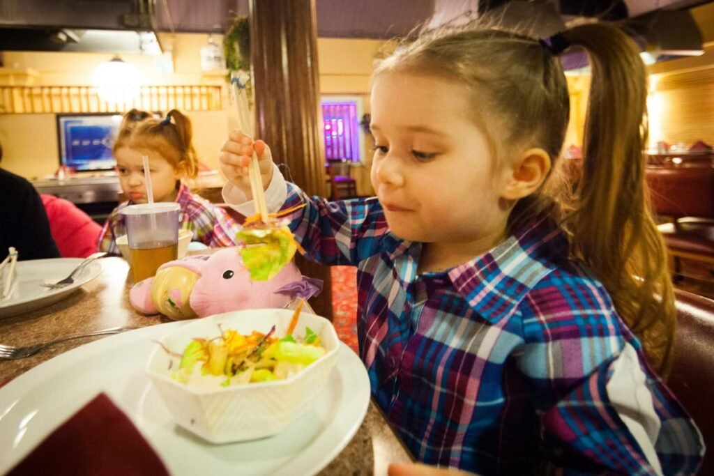 Children Enjoying a Meal at a Casual Restaurant