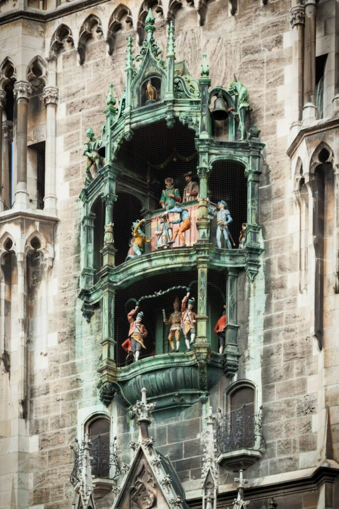 Close-up view of the ornate glockenspiel on the Seville Cathedral facade in Spain.