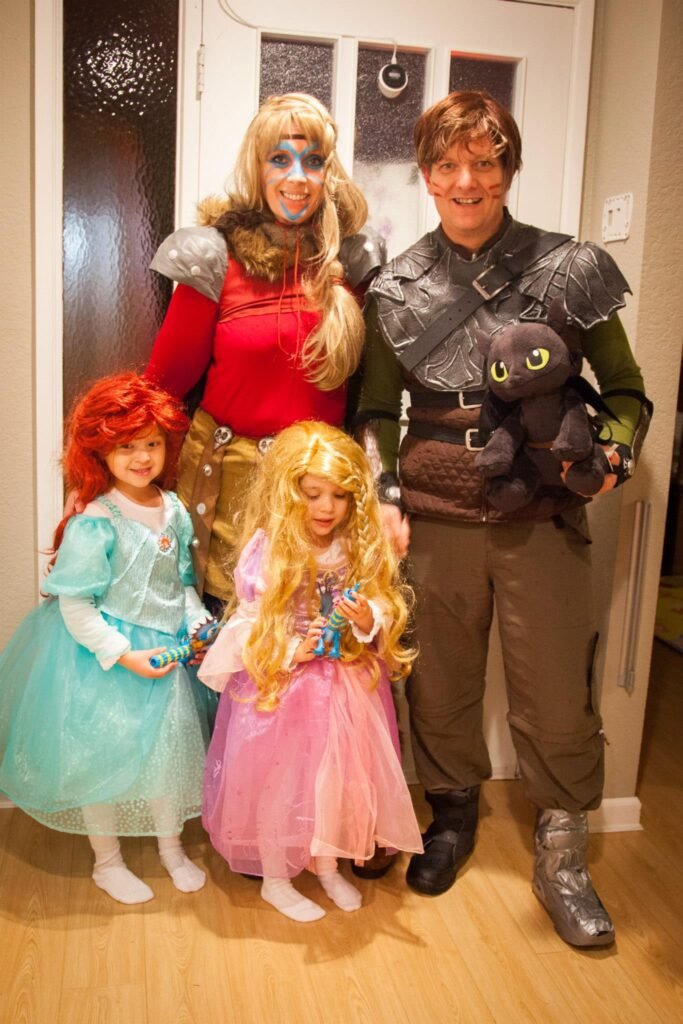 A group dressed in princess and warrior costumes for a costume event.