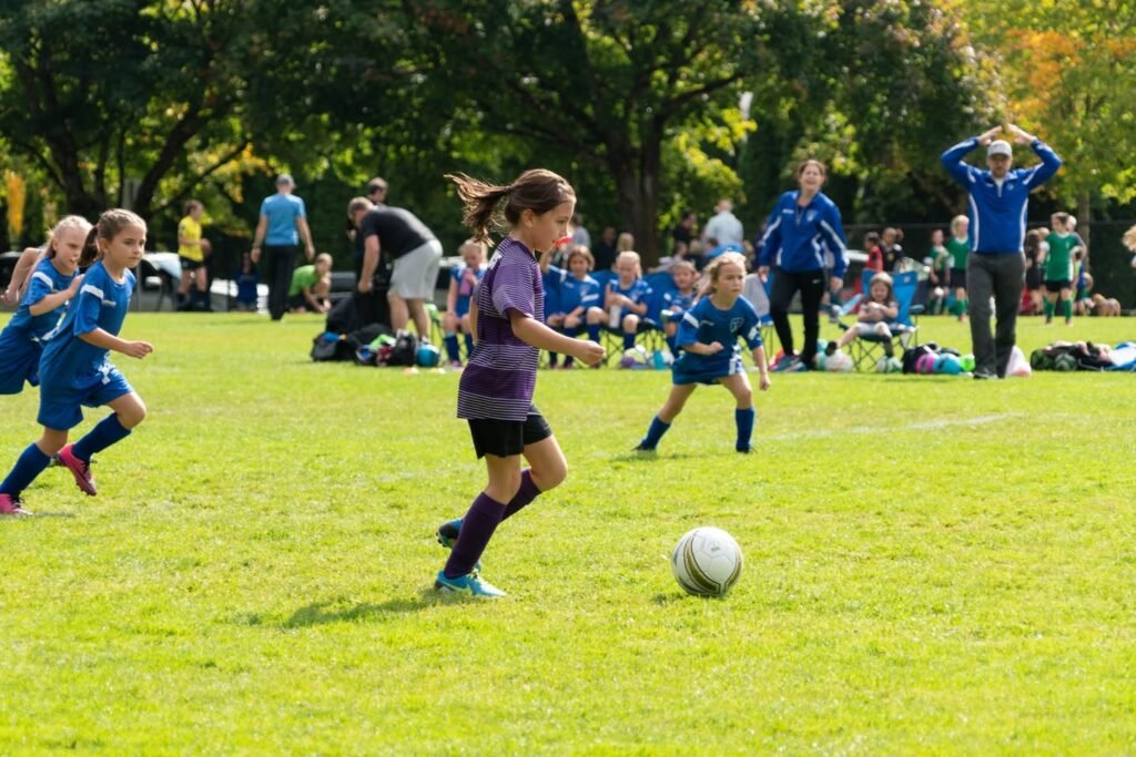 Youth Soccer Match On A Sunny Day