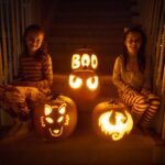 Spooky Halloweencared on a front porch.