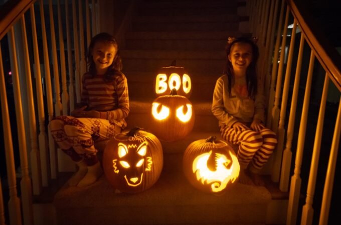 Spooky Halloweencared on a front porch.