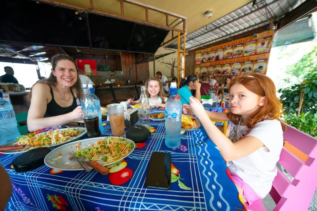 Families dining together at an outdoor cafe