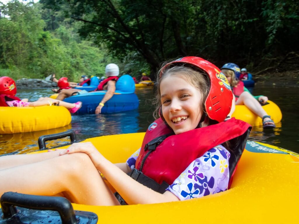 Adventure in inflatable tubes on a river in the lush Pacific Northwest.
