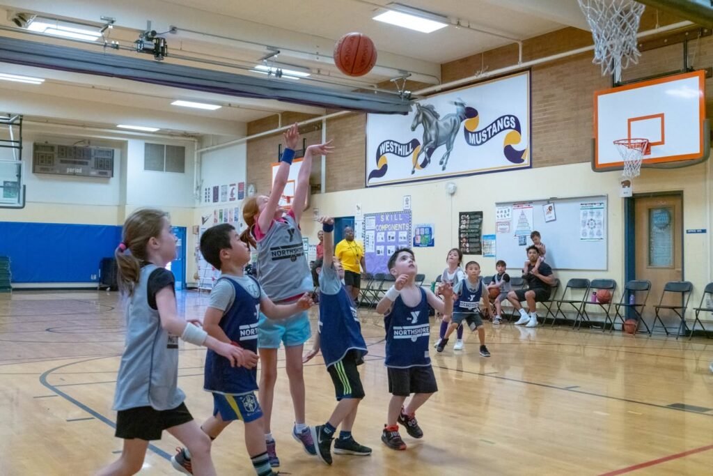 Kids in court, school basketball, gym activity