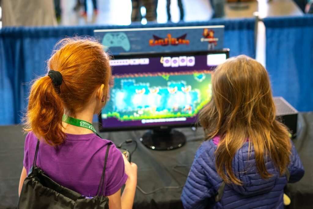 Girls Playing Video Game at Convention