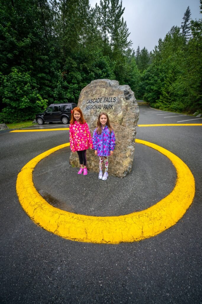 Family enjoying a trip to Snodderly Thum Mountains Park in a lush, forested area.