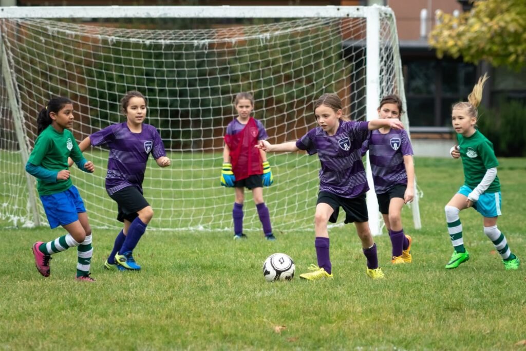 Children Playing Youth Soccer Game