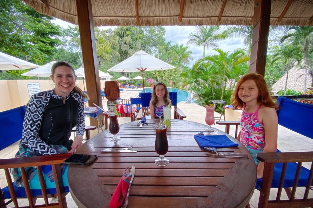 Tropical Tiki Bar with Refreshing Drinks Viewed From a Vibrant Lobby