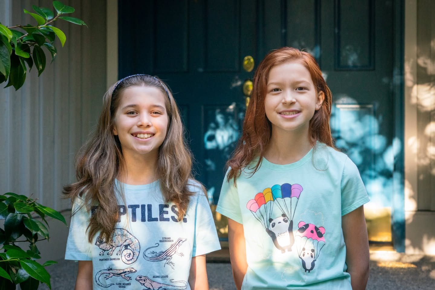 4th Grade Two young girls smiling in their summer outfits. A homey photo capturing personal travel or vacation moments.