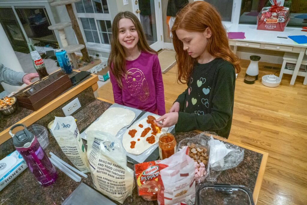 Children enjoy making easy breakfast treats in the kitchen, focusing on creativity rather than perfection.