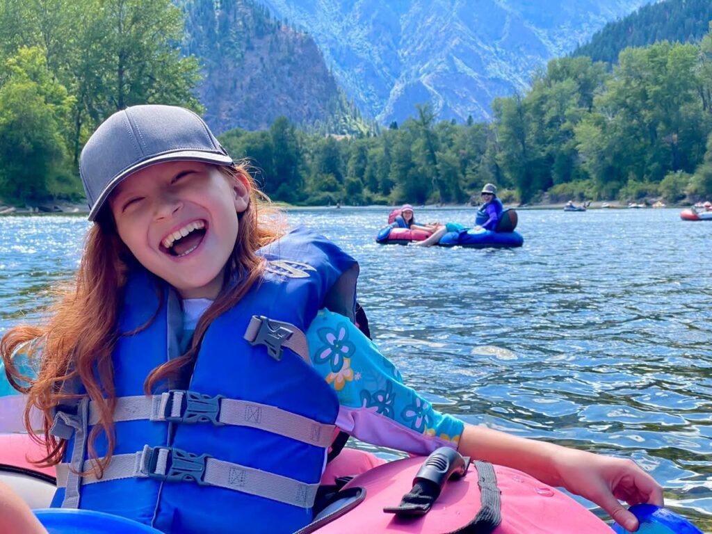 A family enjoying a fun day on the river in the Pacific Northwest.