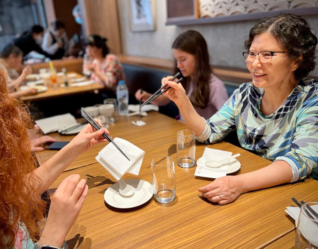 Family Enjoying Sushi Dinner Together