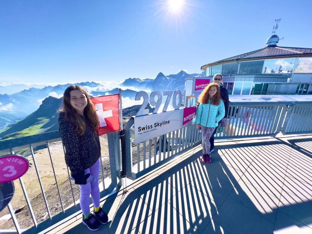 A beautiful day at the Grand Hotel Pilatus, with a stunning view of the Swiss Alps and the 2970 elevation sign.