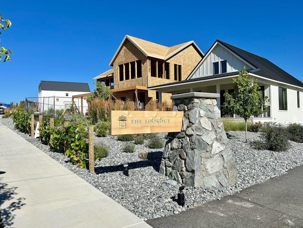 Charming modern homes set against a clear blue sky in the Pacific Northwest.