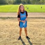 Stranger Things Stop Motion A smiling soccer player wearing a blue and red outfit stands on a field at a local sports event. This image captures moments from our life adventures in the Pacific Northwest.