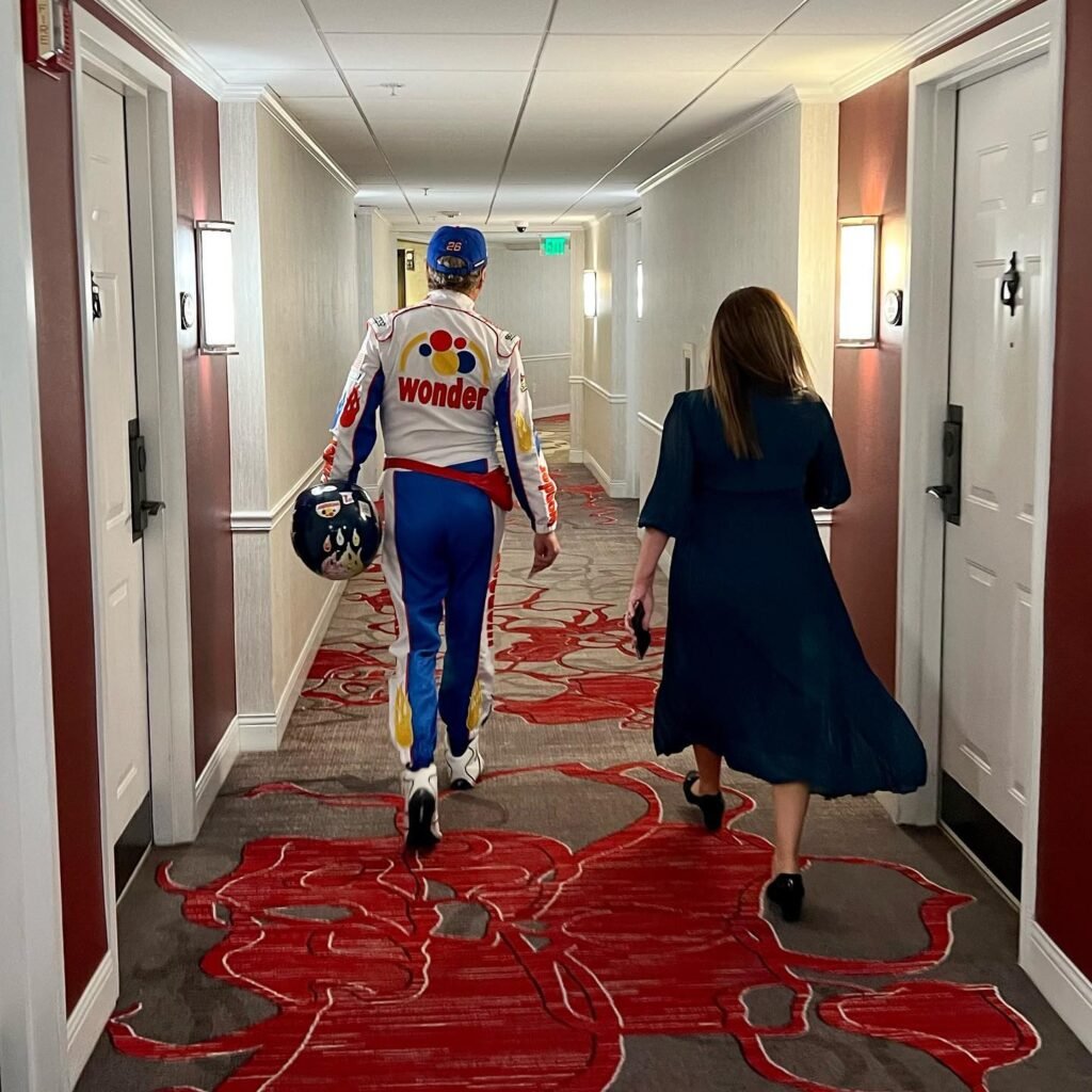 Walking through a hotel hallway with a Driver Wonder Fantasy bus driver