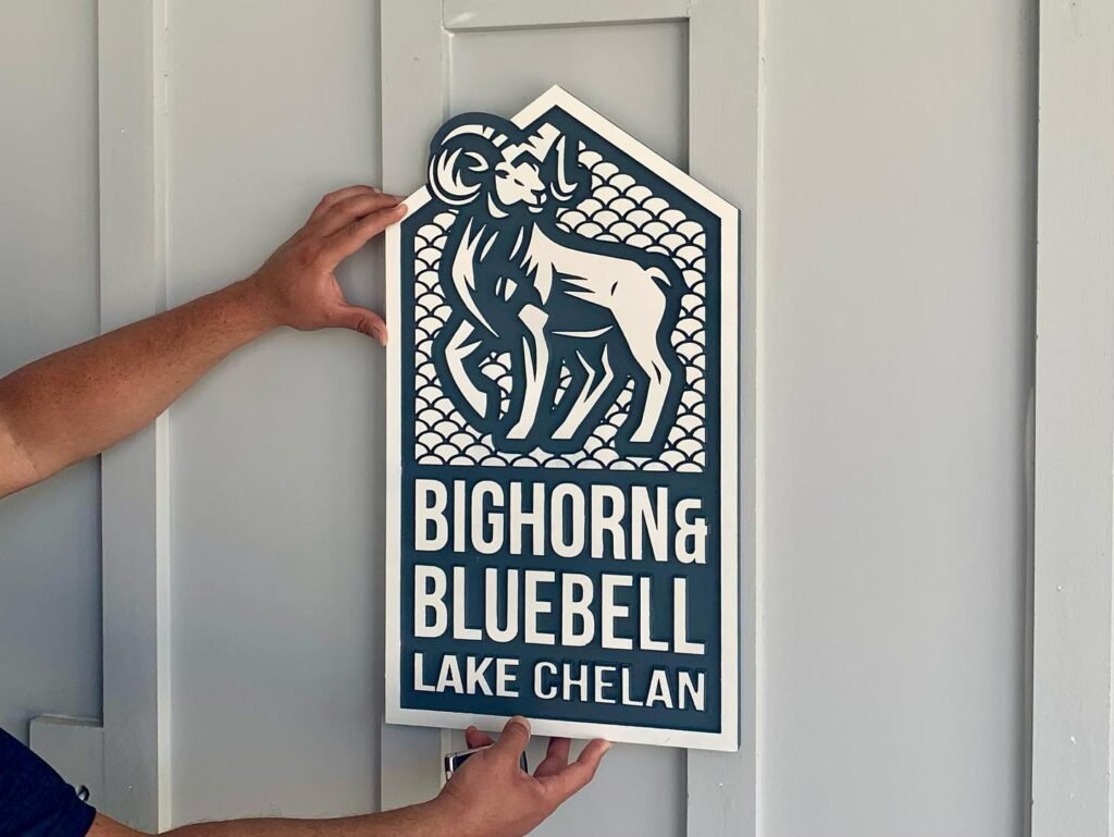 Handing Out Bighorn and Bluebell Signage