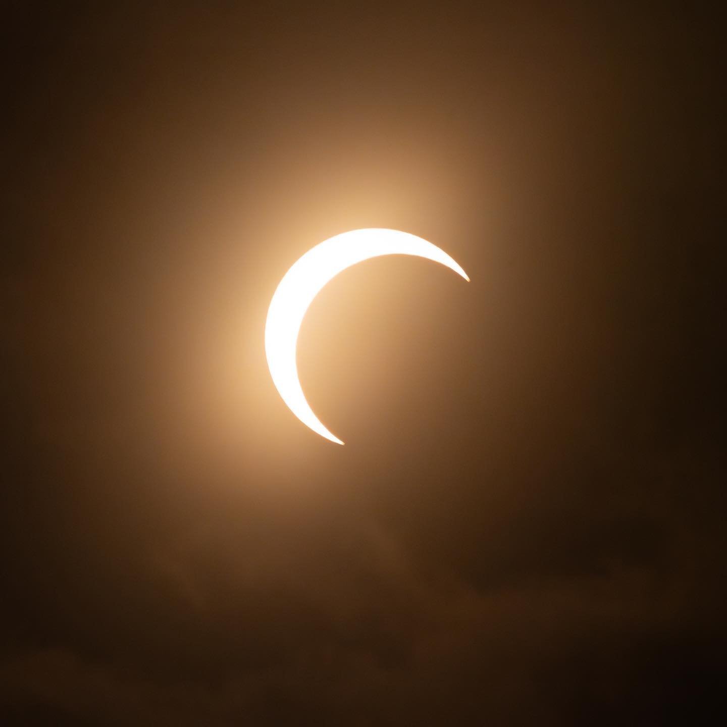 A stunning time-lapse of the 2017 solar eclipse showing the moon moving across the sun in three phases.