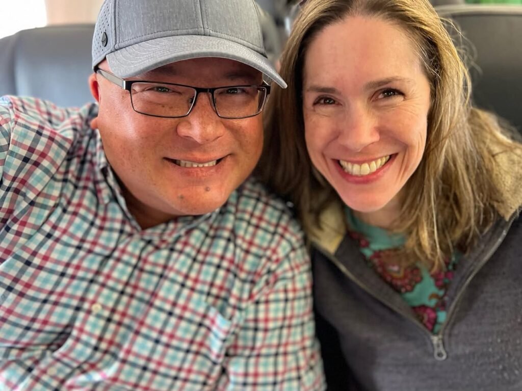 John and Kristie take a selfie during their airplane journey.