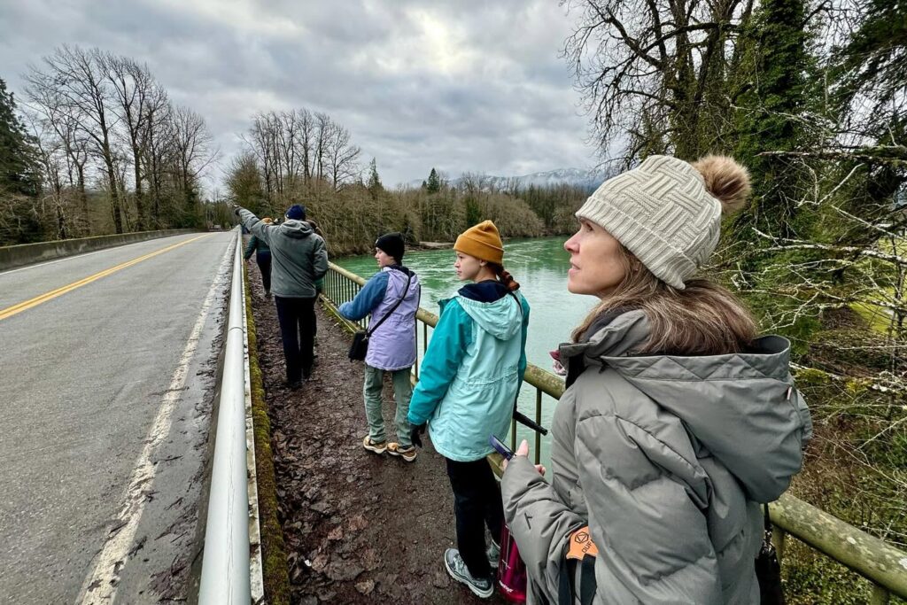 Family View of Turquoise River on Bridge