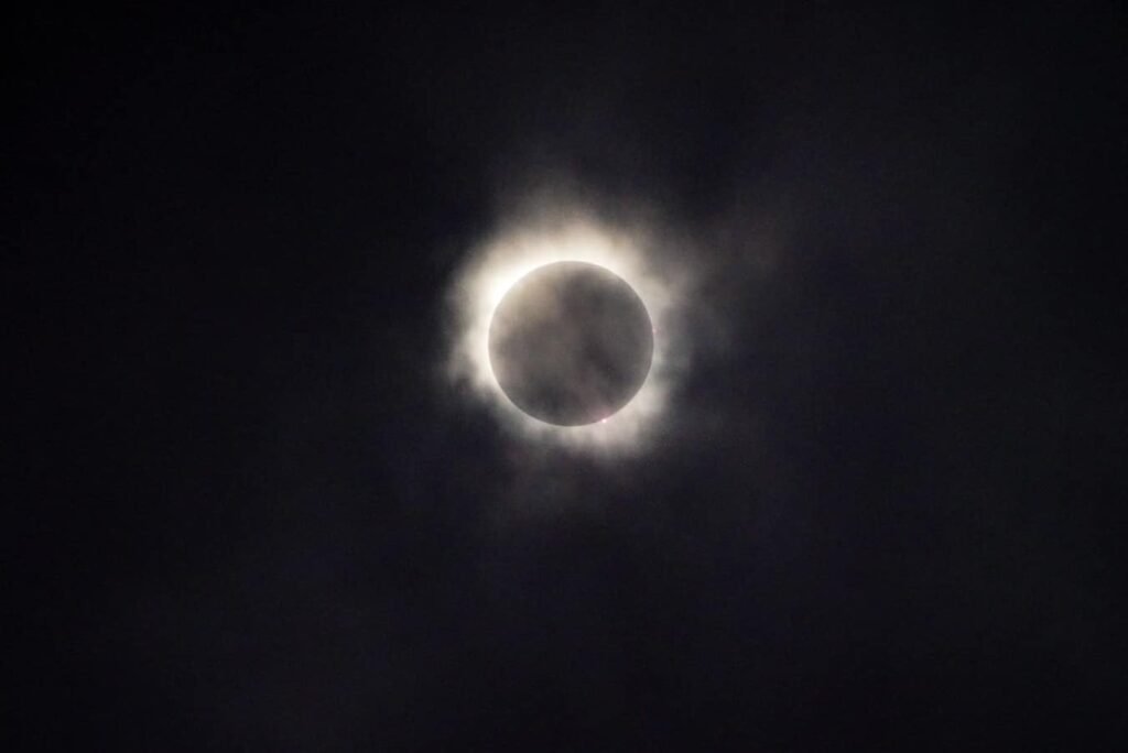 Stunning images of a total solar eclipse with the sun's corona visible.