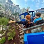 Rulantica A visitor enjoys the Whillmore Express coaster at a magical theme park attraction.