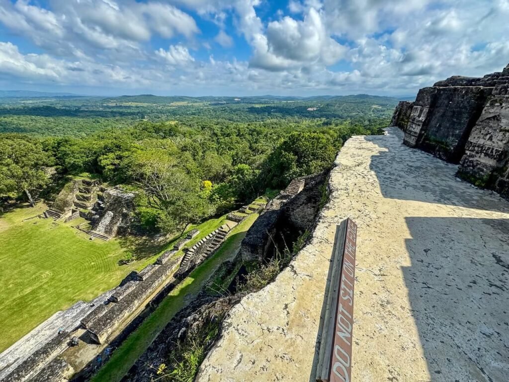 Close-up views of the ancient stone walls, jungle canopy, and sky at Chichen Itza in Mexico.