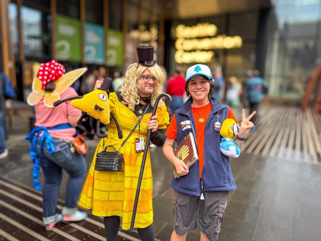 Family posing in whimsical animal costumes outside a SeaWorld entrance. Colorful outfits and hats add fun to the visit.