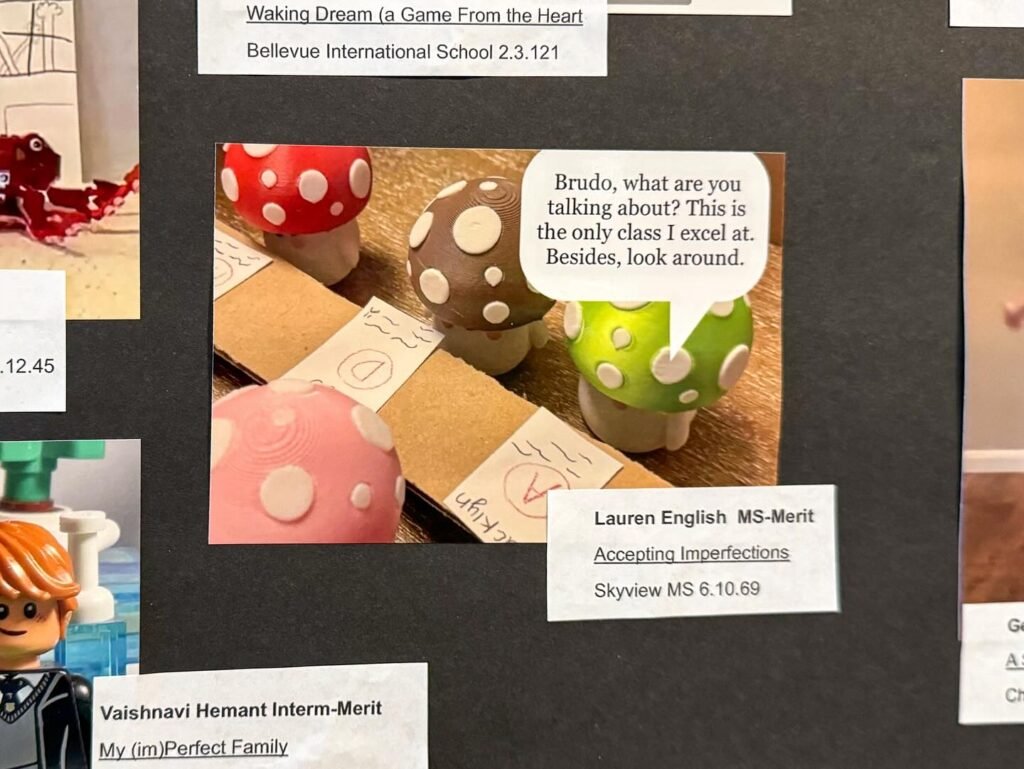 A photo of a handmade polka dot mushroom board game with a speech bubble asking Brudo questions. Surrounding photos include student and intern work projects.