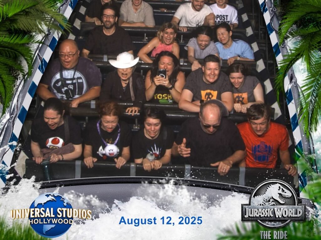 Excited group on a water ride at Jurassic World