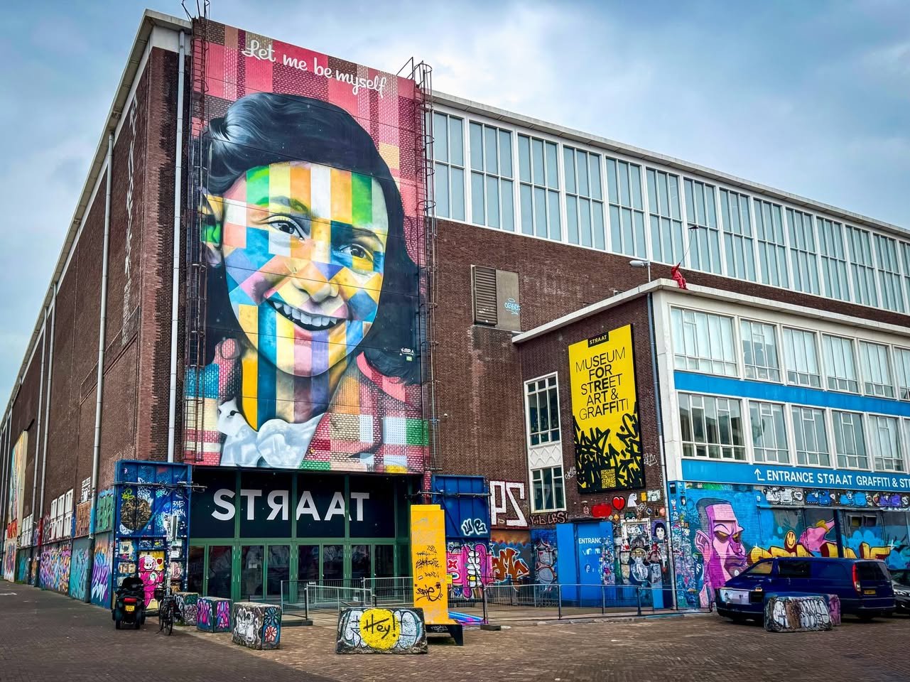 STRAAT Museum Colorful mural on the exterior of STRAAT Museum in Toronto. Street art and graffiti adorn the building's facade.