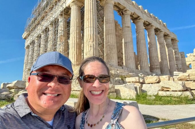 A couple takes a selfie at the historic Parthenon in Athens, Greece.