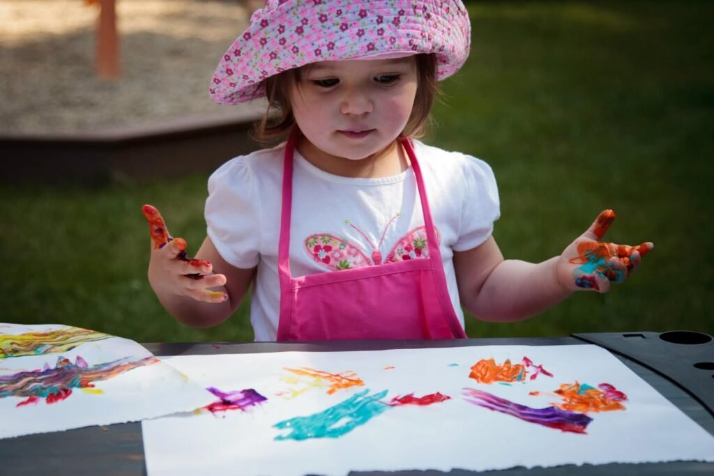 Creative Fingers: Toddler Painting Outdoors