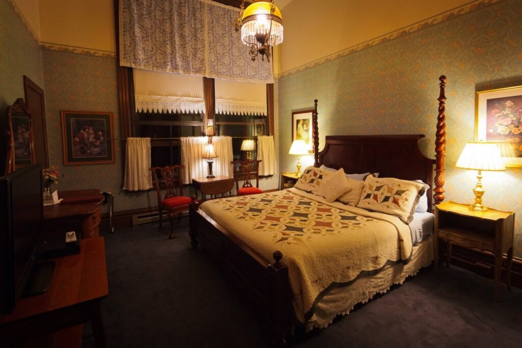 Cozy Vintage Guest Bedroom with Antique Wooden Bed Frame