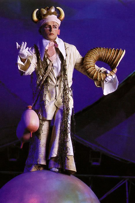 Magical Stage Performer with Ram Horn and Pink Balloon