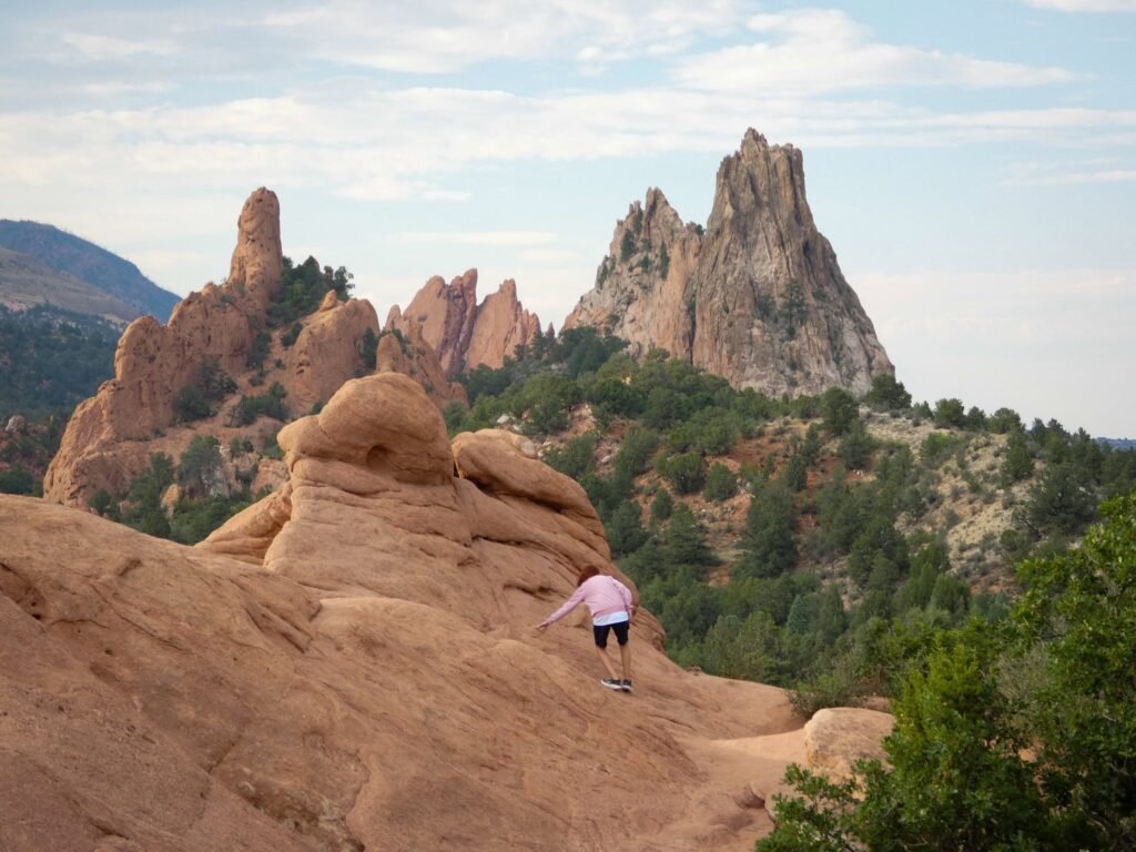 A couple visits the majestic red rock formations of Colorado's Garden of the Gods.