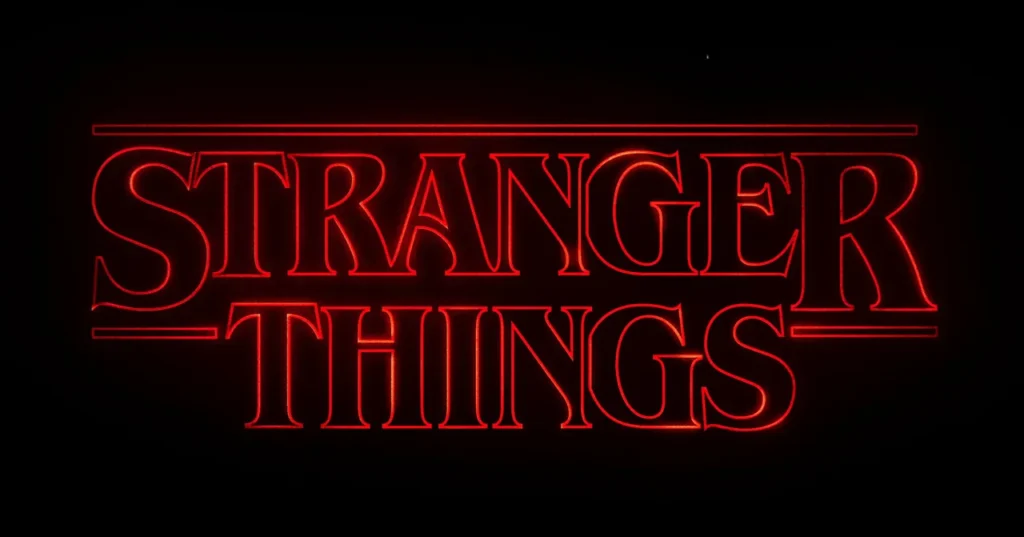 A detailed view of the Stranger Things logo in red neon. The image highlights the classic serif font and retro styling.
