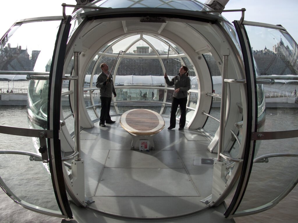 Guests enjoy a unique experience inside glass pods with panoramic views of the Washington Monument.