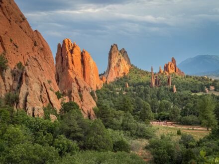 Dramatic red rock formations and lush greenery at Garden of the Gods.