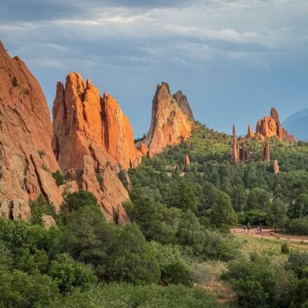 Dramatic red rock formations and lush greenery at Garden of the Gods.
