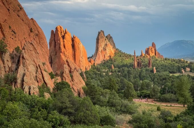 Dramatic red rock formations and lush greenery at Garden of the Gods.