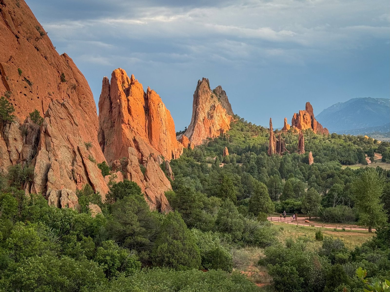 Dramatic red rock formations and lush greenery at Garden of the Gods.