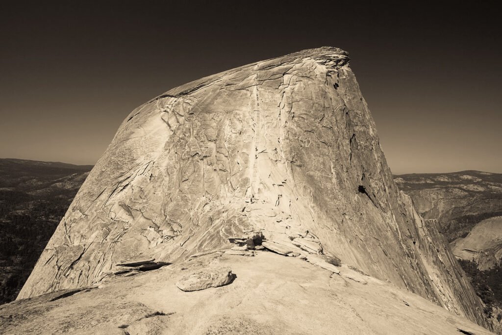 A panoramic view from the summit of Glider Rock with its iconic cliffs and vast landscape.