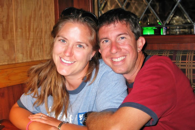 A cozy moment captured as John and Kristie enjoy a meal together at a local Seattle restaurant.