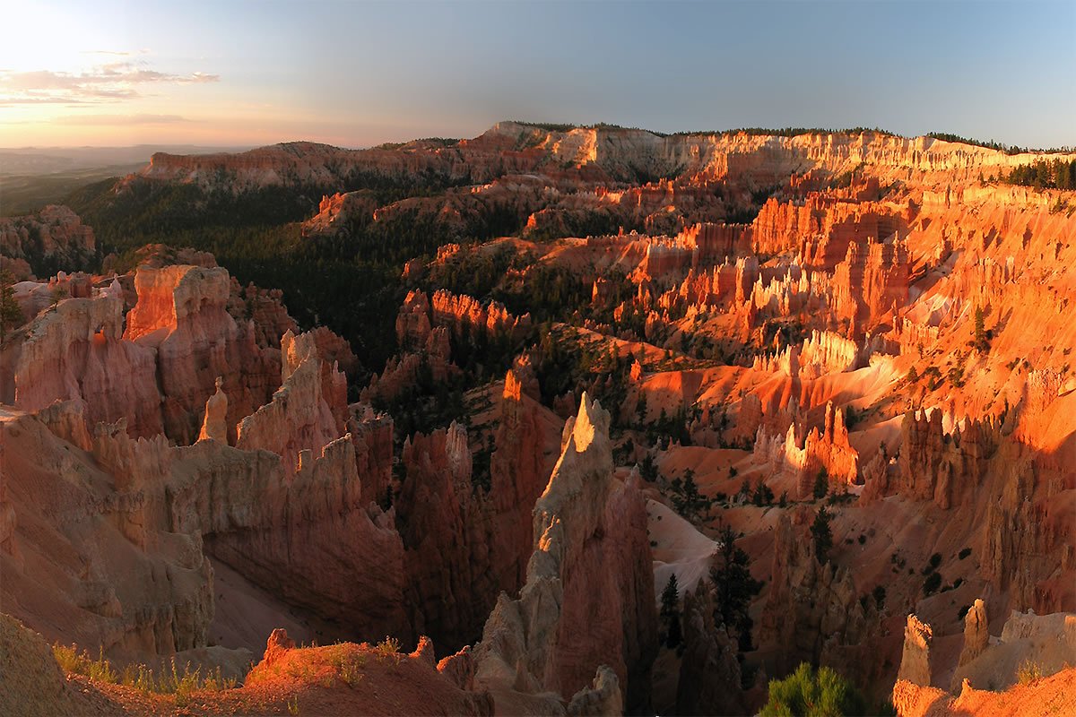 Bryce Canyon A breathtaking view of a towering rock formation under a clear sky.