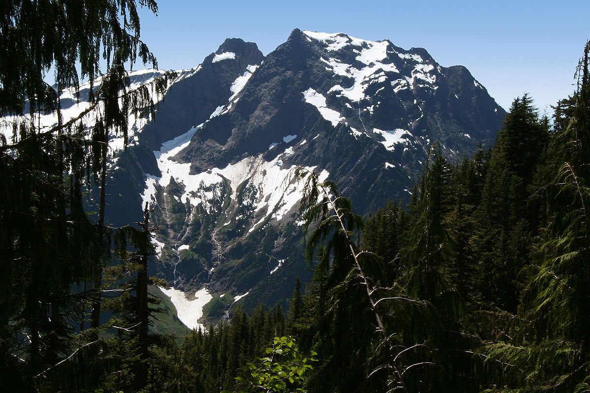 Mt. Dickerman A white book with 'mypubl' branding and a photo on its cover, alongside a kraft envelope.
