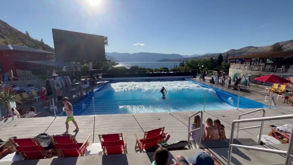 Visitors enjoy a sunny day at the Waves Water Park pool.