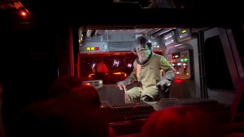 A scene from the Enterprise starship attraction at Star Wars: The Secrets of the Empire, depicted in red lighting.